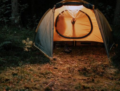 Silhouette Photo of People Inside a Tent